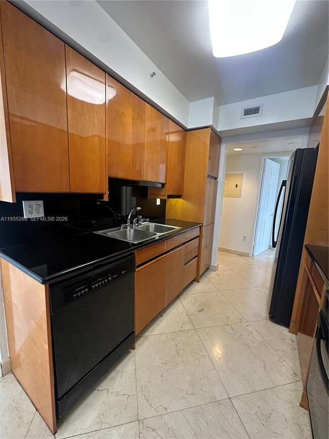 Building Photo - 18671 Collins Ave