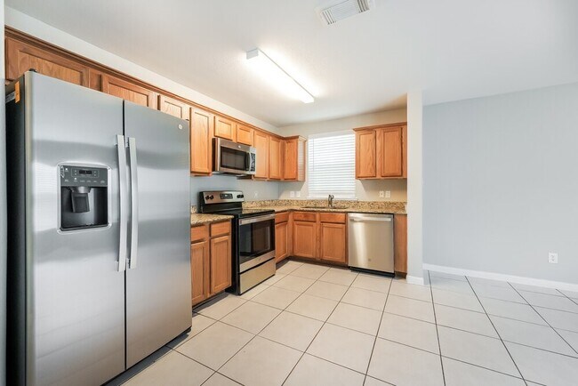 Building Photo - 4955 N Cancun Dr