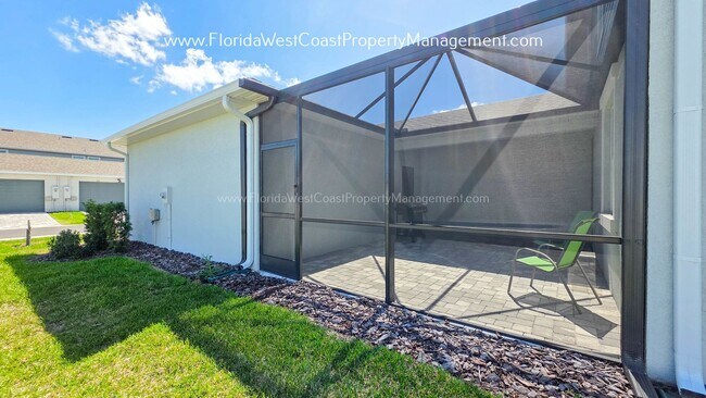 Building Photo - EXCEPTIONAL AND SPACIOUS FURNISHED TOWNHOME WITHIN WATERSIDE- NAUTIQUE!