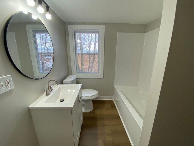 Building Photo - More Space Than You’d Expect: Updated 3BR w/ 1.5 Baths + Carpeted Attic Bonus