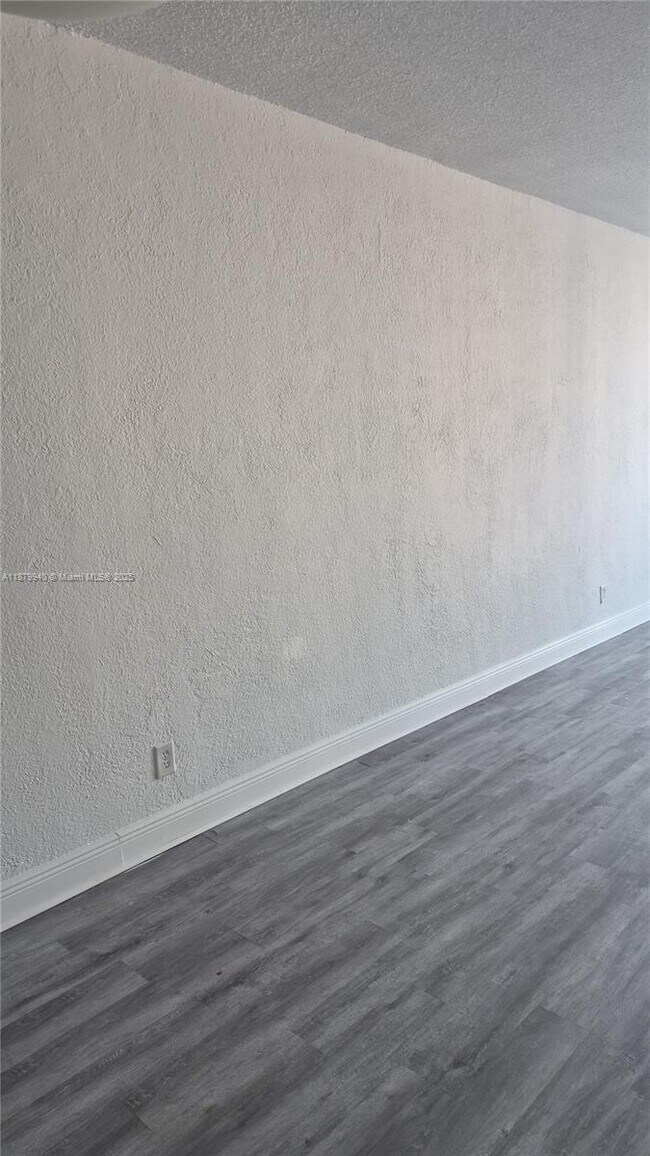 Building Photo - 19390 Collins Ave