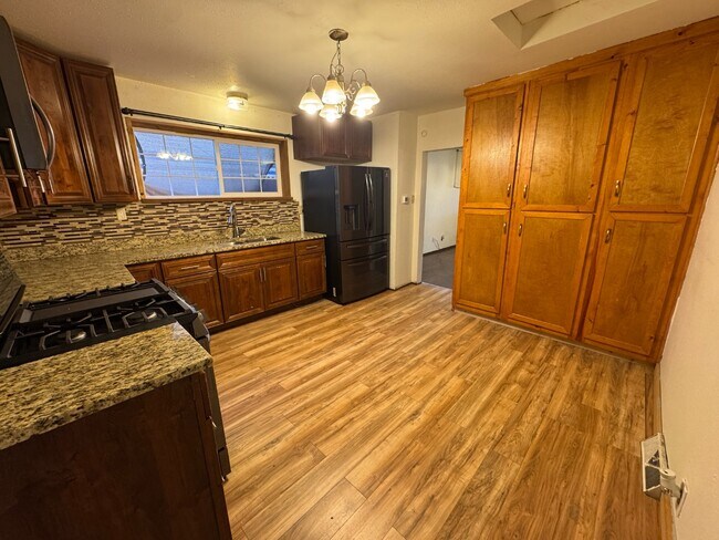 Building Photo - Classic Denver Home: 3 Beds, Updated Kitchen, Private Yard, Parking