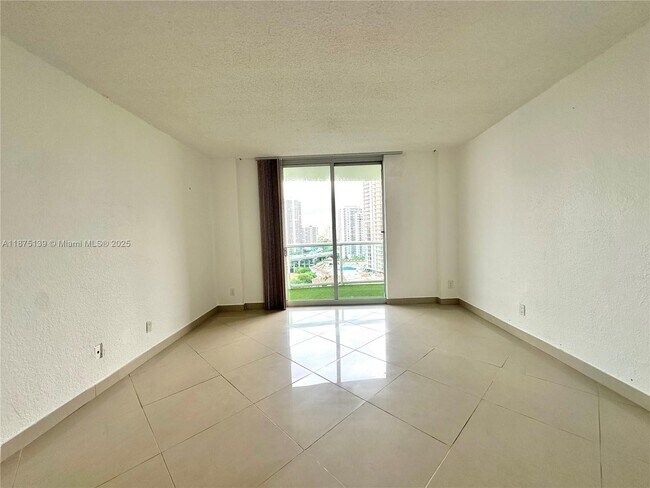 Building Photo - 19390 Collins Ave