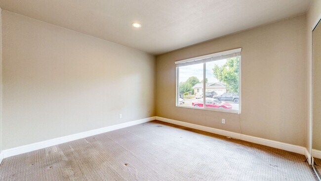 Building Photo - Bright 2 Bedroom, 1 Bathroom Single Family Home! Attached 2 Car Garage and Landscaping Included!