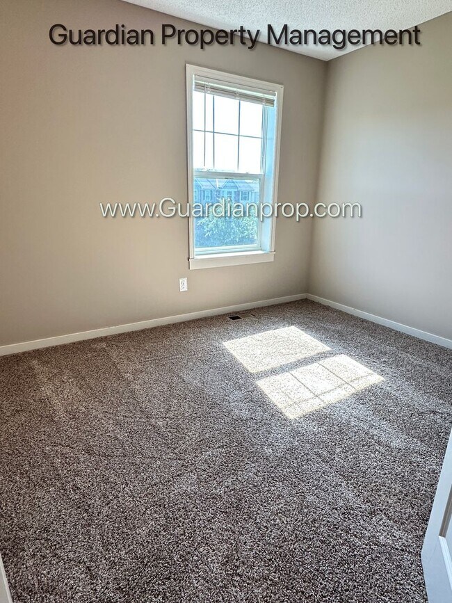 Building Photo - Champlin Corner Unit Town Home, 2 Car Garage, Dishwasher, Washer/Dryer, Balcony