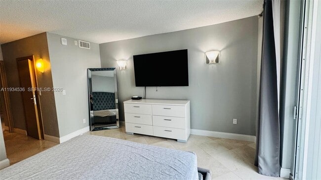 Building Photo - 19390 Collins Ave