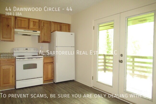 Building Photo - Pet Friendly Condo close to town and ready...