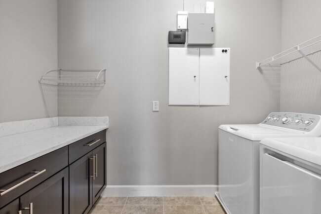 Building Photo - Move In Ready End Unit Townhome in Laureate Park | 3 Bed | Tesla Charger