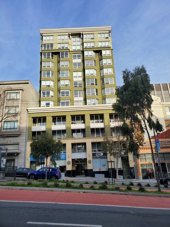 Building Photo - Downtown High-Rise Studio with parking and in-home laundry