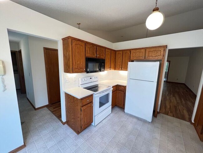 Building Photo - End Unit Single Level Townhouse, New Floor...