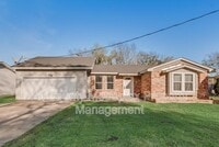 Building Photo - 1303 S Medora St