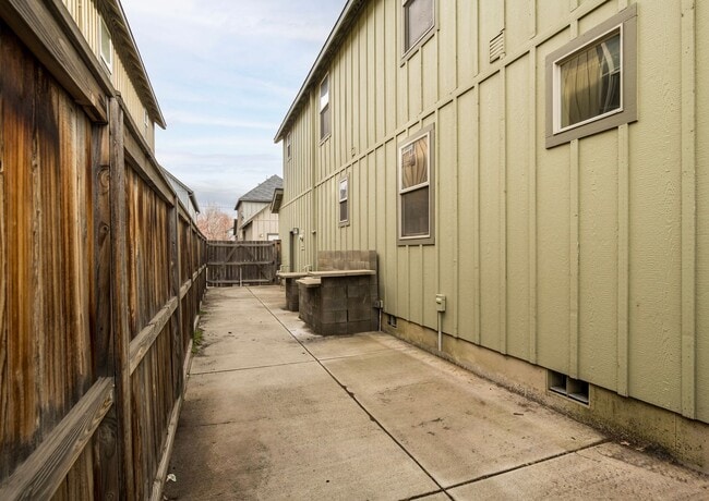 Building Photo - Spacious 4-Bedroom Home with New Paint & Carpet, Fenced Yard