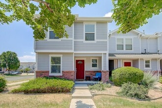 Building Photo - Evolve Real Estate: Beautiful Corner Townhome Available for Move-in on July 21st!