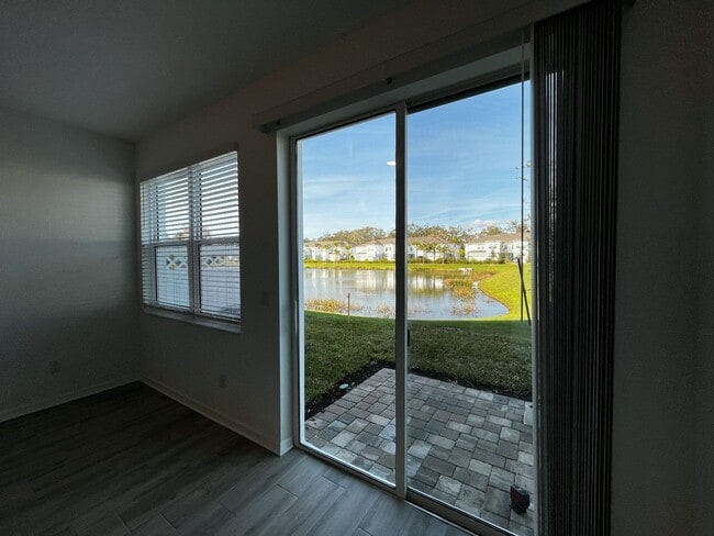 Building Photo - Townhome with garage, excellent location, community pool and more