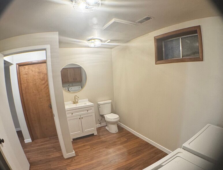 Downstairs laundry and bath - 1118 E 14th Ave