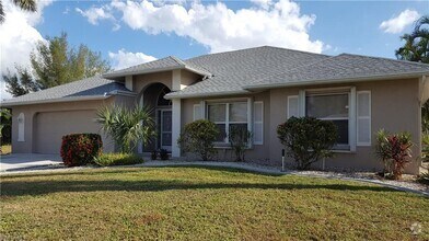 Building Photo - Gulf access Pet Friendly Pool home in SW C...