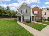 Building Photo - Freshly Renovated 2 BR, 2.5 BA Townhome Ce...