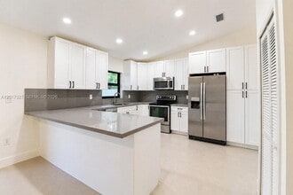 Building Photo - 10088 SW 143rd Ct