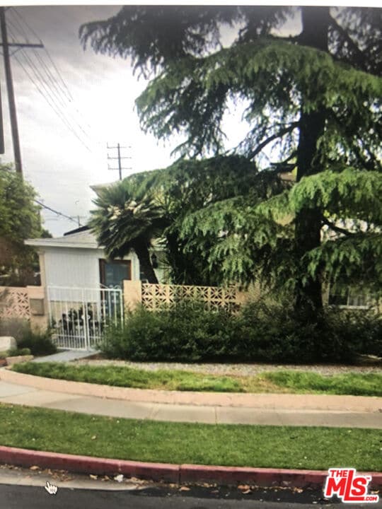 Building Photo - 5803 Irvine Ave