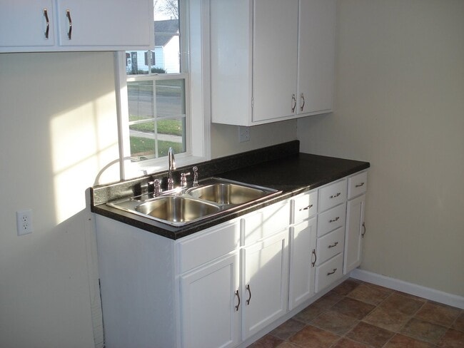 Building Photo - Three Bedroom One Bath Home Available May 10th