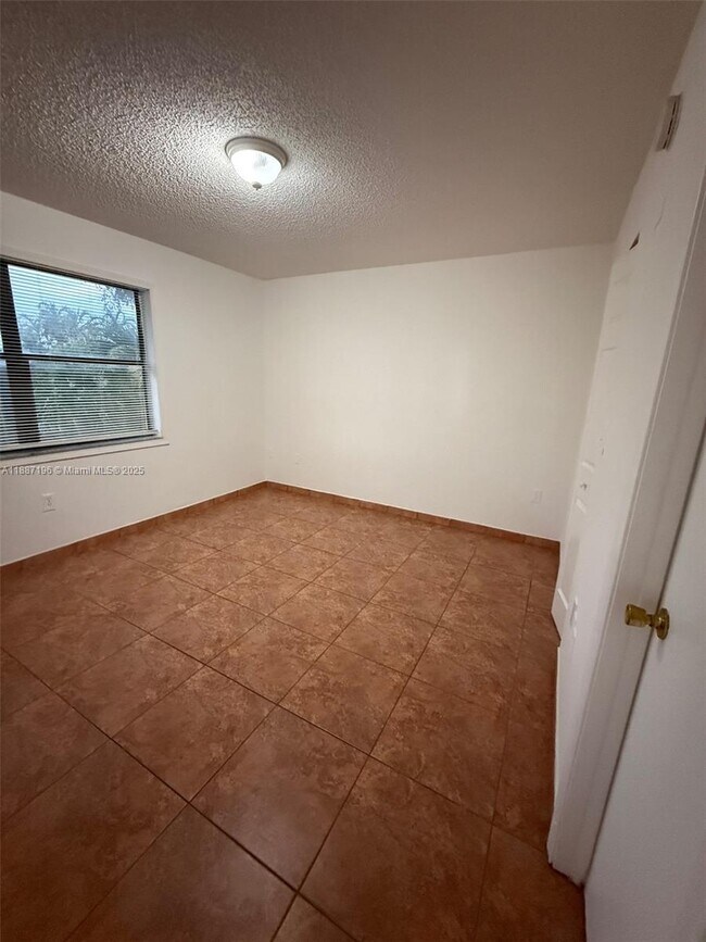 Building Photo - 10843 NW 7th St
