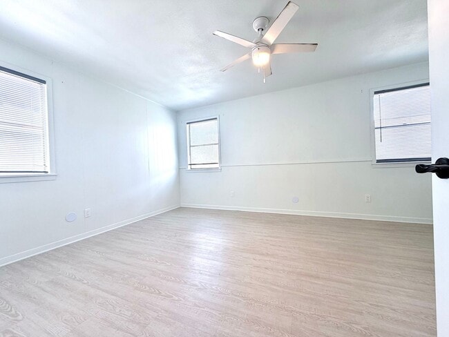 Building Photo - Stylish Two-Story Duplex with Loft, Fireplace & Private Backyard in New Braunfels!