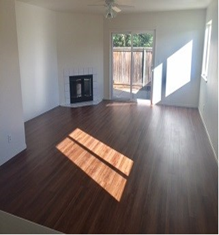 LIVINGROOM WITH FIREPLACE(LVP FLOORS) - 9000 Kern Ave