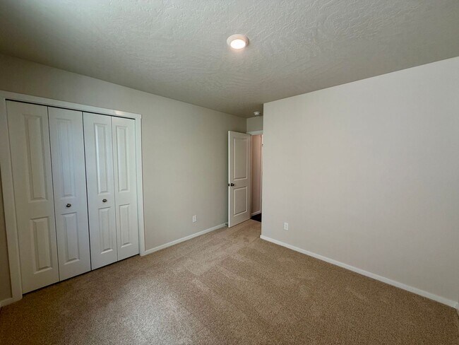 Building Photo - Beautiful & Brand New- 4 bed, 2 bath w/Quartz Countertops & Fenced Yard