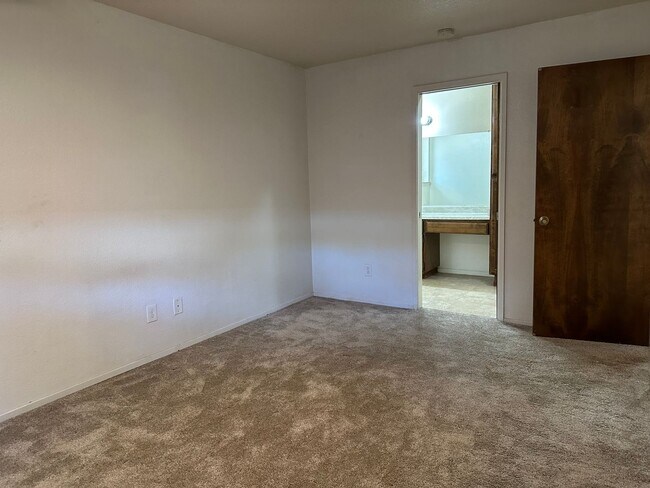 Building Photo - Charming Redding Home with Fireplace & Vau...