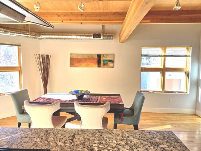 Building Photo - Spectacular Loft-style Condo with Snowcap ...