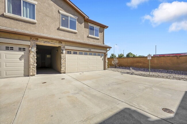 Building Photo - $1,849.00 - 3 Bed, 2.5 Bath Townhome in CO Springs with AC and In Unit Laundry!