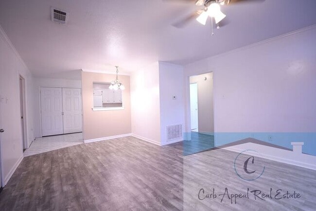 Building Photo - First month move in special $900!! Beautiful 3-bed, 2 bath condo with 2-car garage - includes was...