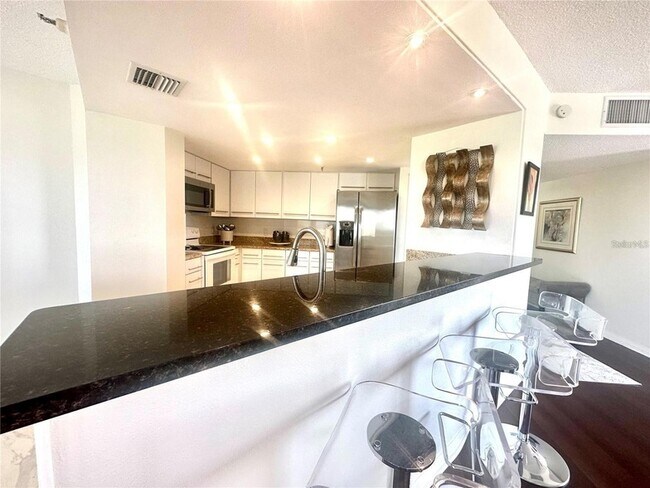 Building Photo - 5950 Pelican Bay Plaza S