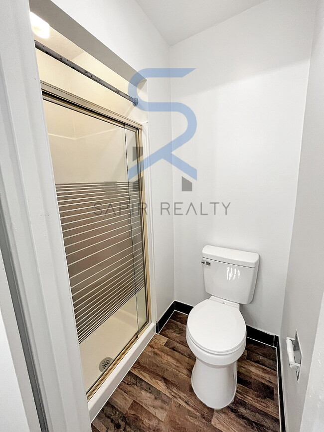 Building Photo - Move in before December 15th and choose your reward: a $250 Amazon Gift Card or a 55" Smart TV!