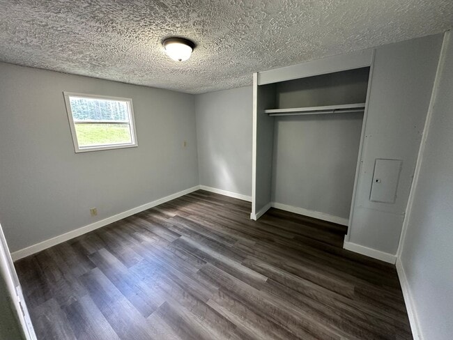 Building Photo - Updated single wide. Water/lawn care inclu...