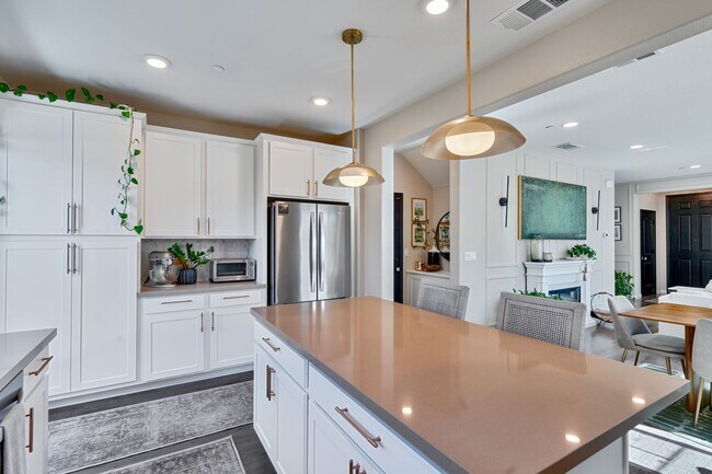 Building Photo - Designer Upgrades & Custom Touches in This...