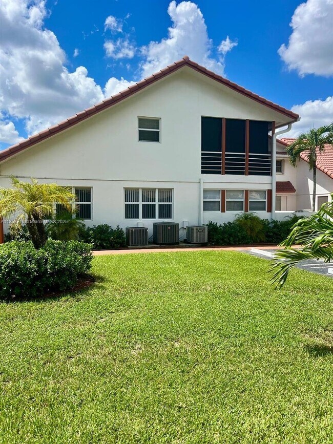 Building Photo - 3200 Coral Springs Dr