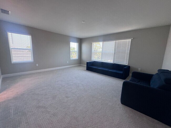 Building Photo - New Construction in Grand Park-4 Bedrooms and 4 Bathrooms with a Den and a Loft! No deposit for q...