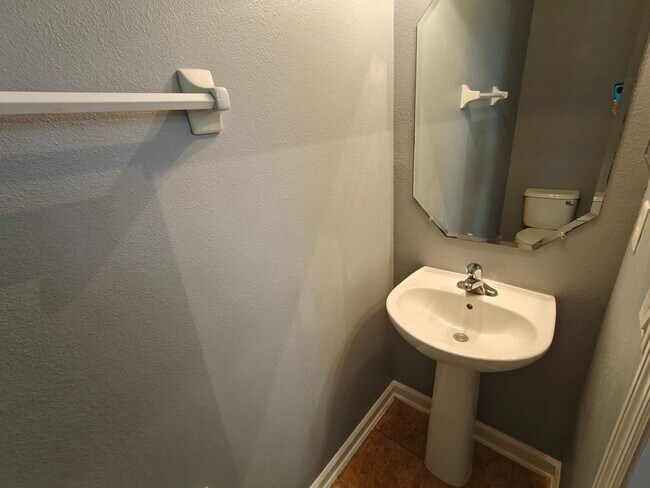 Building Photo - Spacious 2-Bed, 2.5-Bath Townhome with Gar...