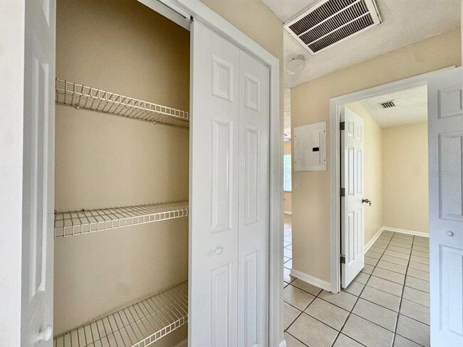 Building Photo - 10015 N Aster Ave