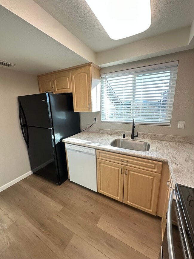 Building Photo - 2BR/1.5BA 2-story condo in El Cajon, gated community with sparkling pool, 2 car attached garage, ...