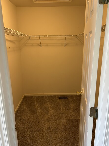 Master bedroom walk in closet - 69 Walker Rd