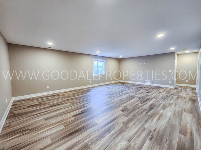 Building Photo - Spacious Waukee Ranch | 4 Bedrooms | 3-Car Garage | Finished Basement