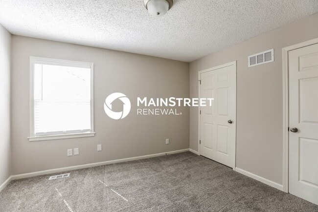 Building Photo - 4 Bedroom Pet-Friendly Home in LIBERTY, MO with Main Street Renewal