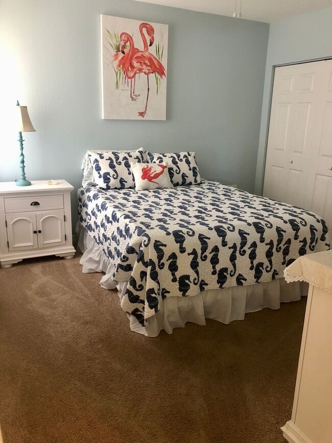 Building Photo - Beautiful furnished 2/2 unit becoming avai...