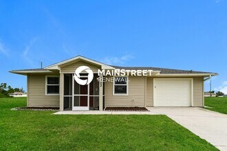 Building Photo - 3 Bedroom Pet-Friendly Home in Cape Coral, FL with Main Street Renewal