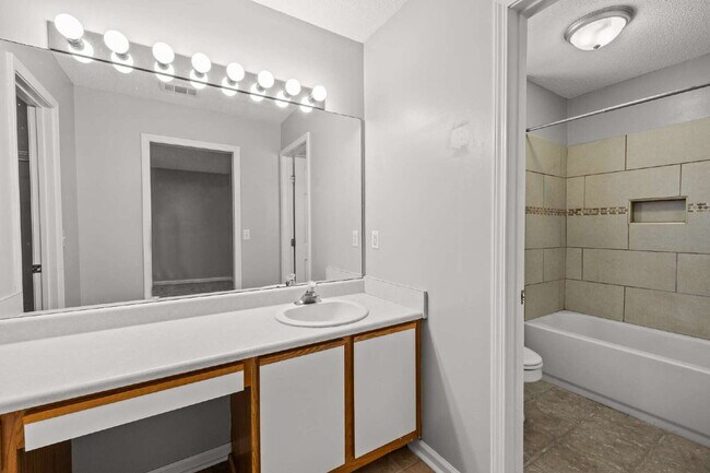 Building Photo - Charming All-Brick Home with Garage & Covered Patio!