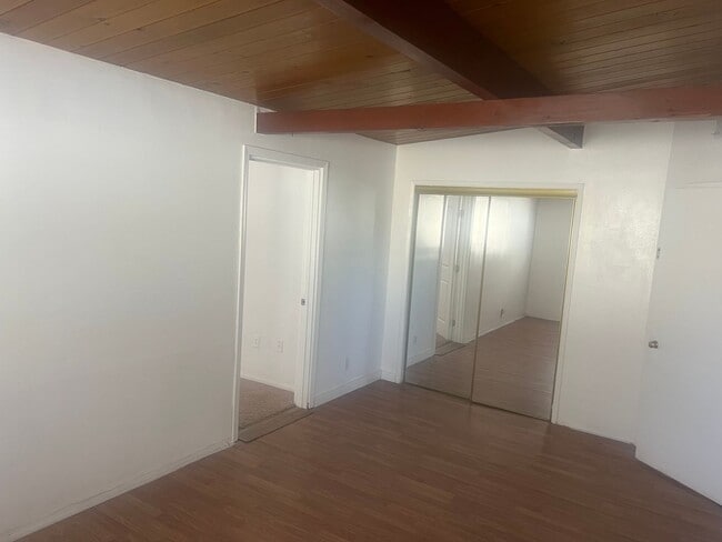 Building Photo - Charming 3-Bedroom Home with Wood Ceilings...