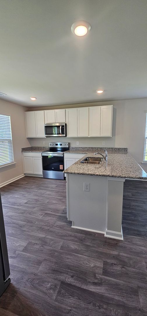 Building Photo - Brand-New Smart Home in the Gated Sandpipe...
