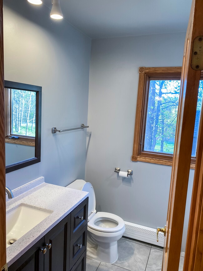 Upstairs bathroom - 1606 S Lake Irving Dr SW